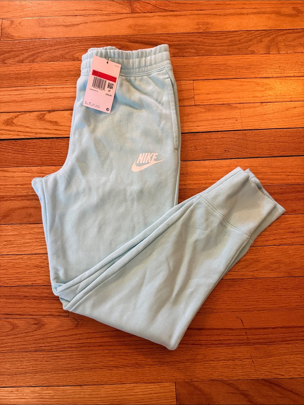 Nike Light Blue Kids Fleece Joggers with White Swoosh